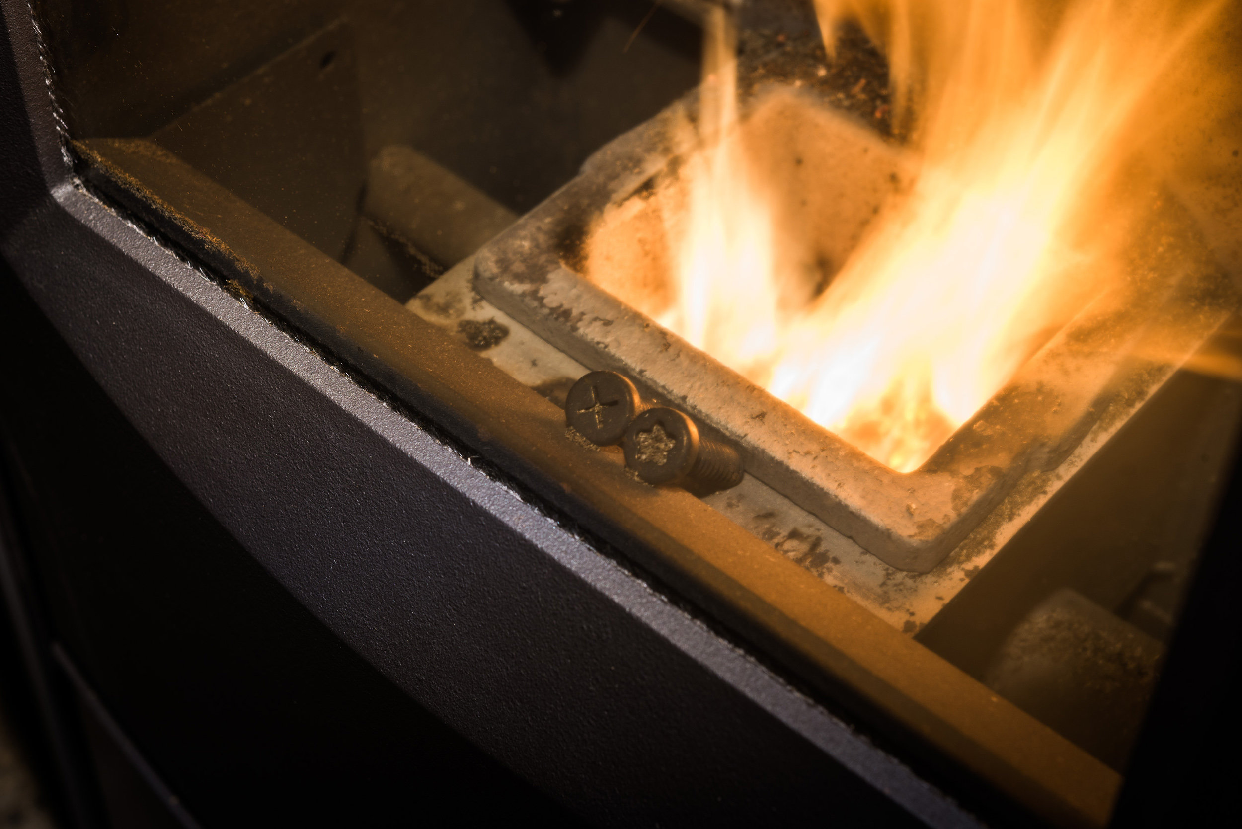 Stove No. 1, (Background Immunity), 2016 Pellet stove and 3D copper screws