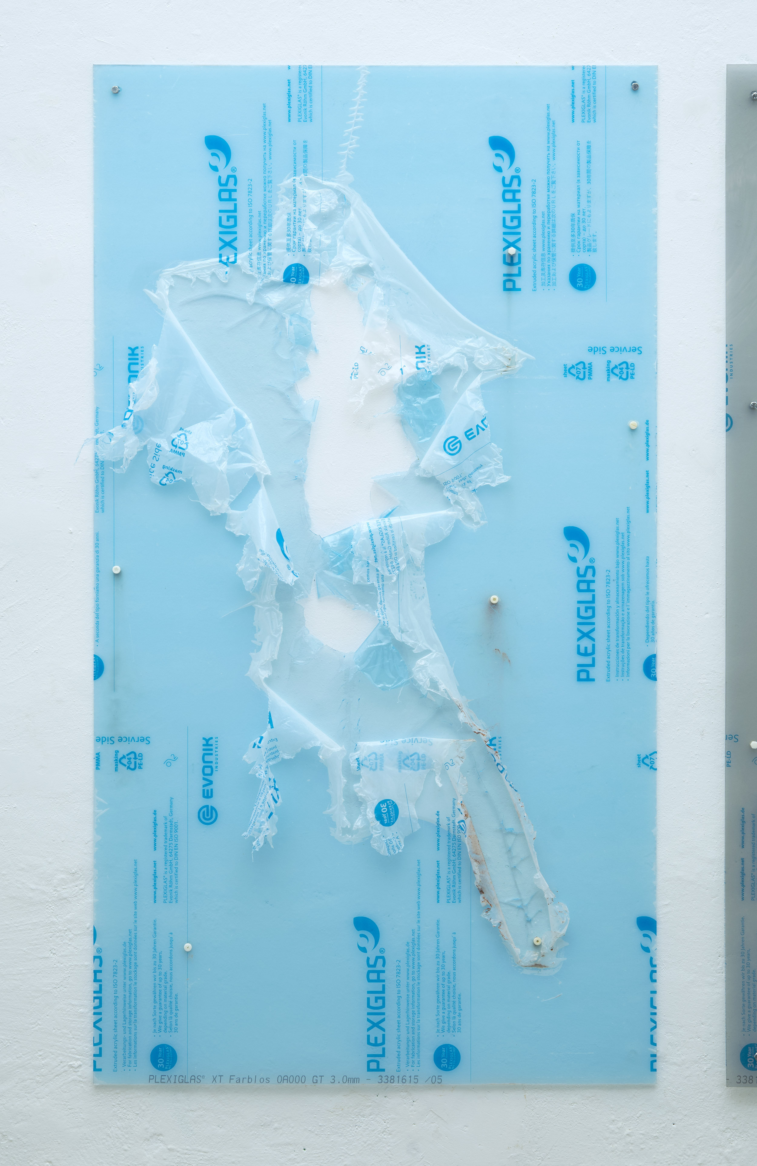 Preresolution No. 3, 2016 Broken panel of polymethyl methacrylate, industrial screws, 3D-printed screws (ABS) and wall dust 180 x 100 cm