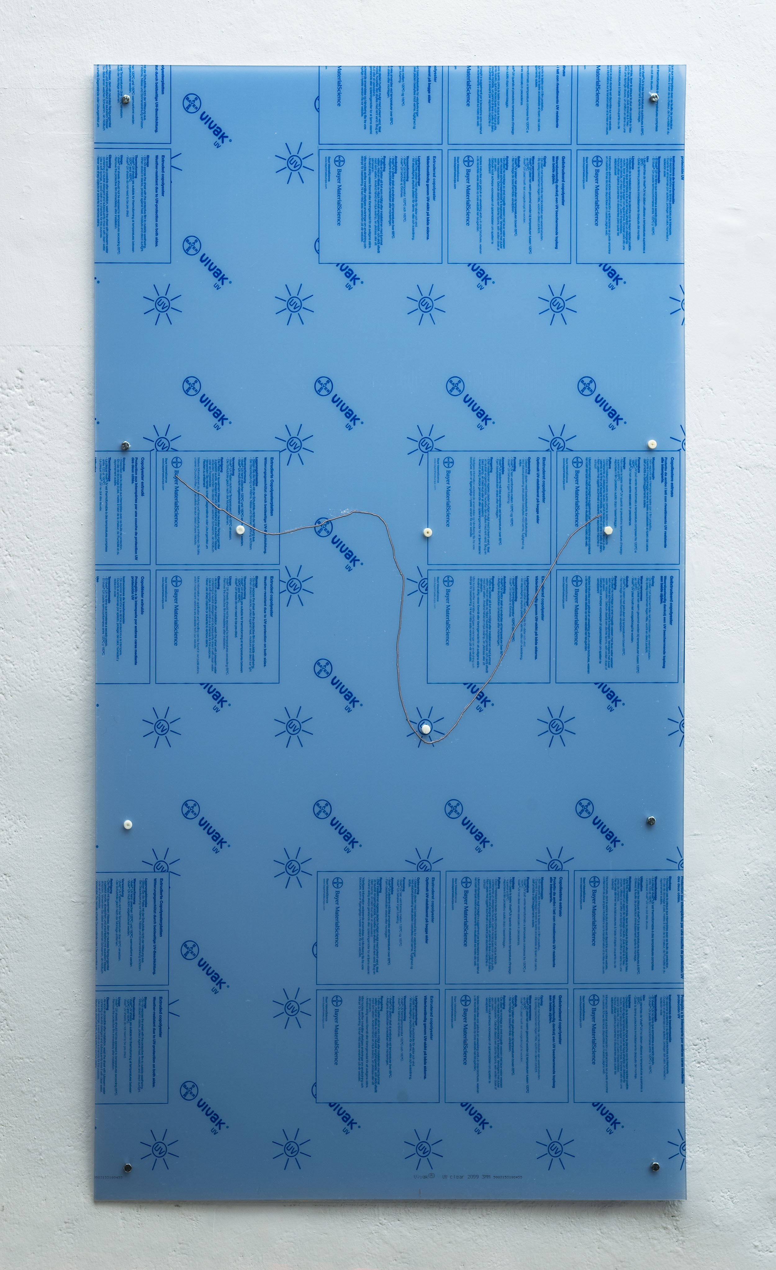 Handy Rule No. 1, 2016 Two polyester panels, industrial screws, 3D-printed screws (ABS), commercial aspirin, domestically synthesised aspirin and wall dust 180 