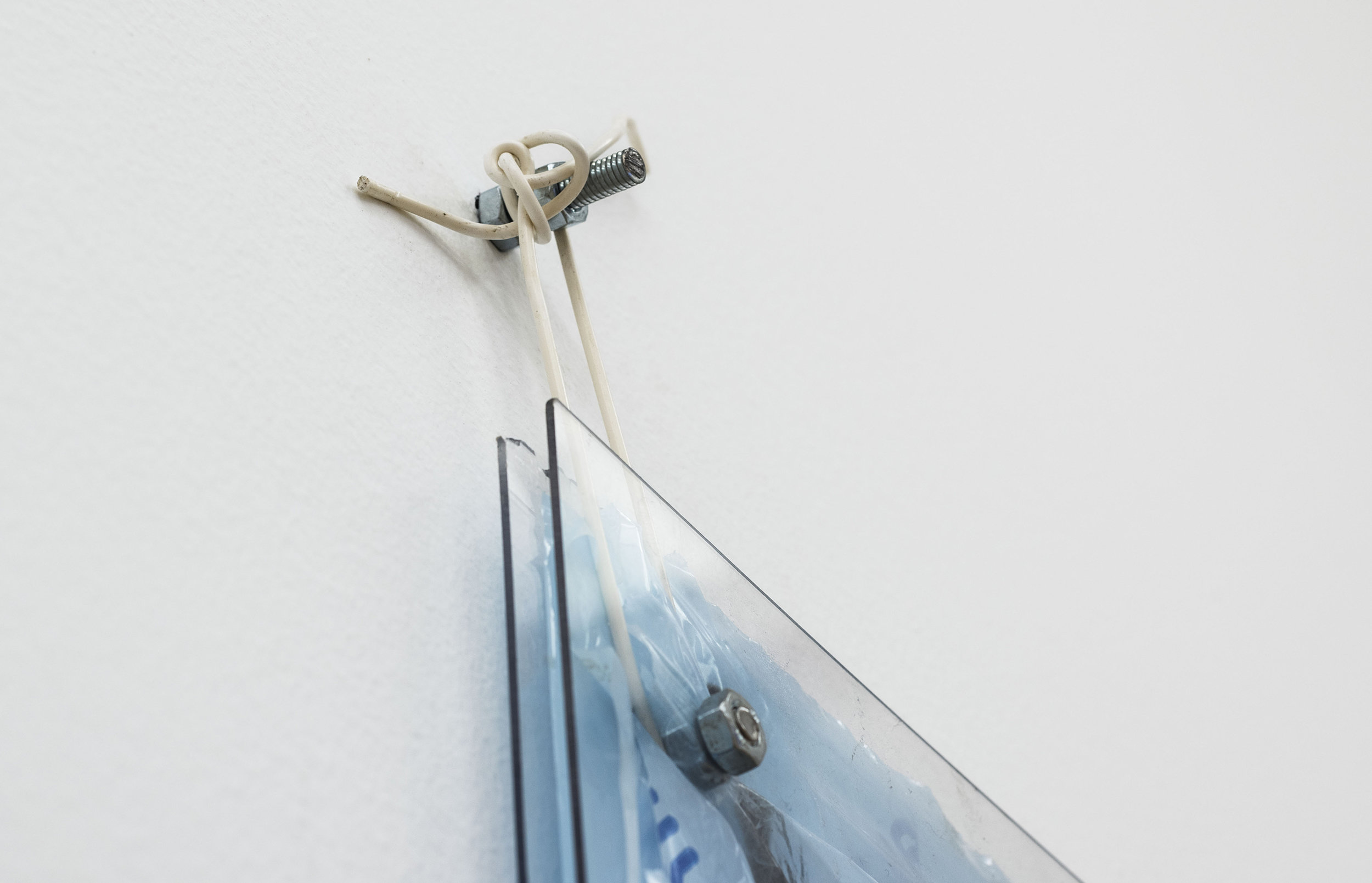 Oriended Combustions (Mechanical Miracle), 2016 Two polyester panels, industrial screws, 3D-printed screws (ABS), Fireproof ABS filament for 3D printing, Laser 