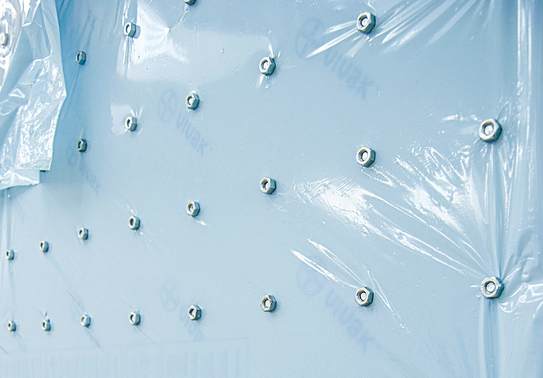 Serial Deduction No. 3, 2016 Two polyester panels, cork board, artificial snow, industrial screws, 3D-printed screws (ABS), and wall dust 180 x 95 cm